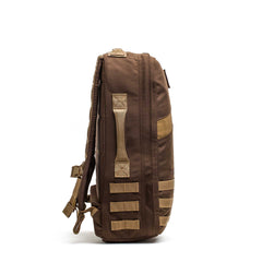 Side view of the Rucker 4.0, a brown rucking backpack with beige straps and multiple loops for versatile use, shown on a white background.