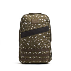 The Rucker 4.0 - Reflective Spearhead is an olive green rucksack with white geometric patterns and a black diagonal stripe, designed for stylish rucking and standing upright on a white background.