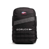 GORUCK Rucker 20L black backpack with American flag patch and MOLLE webbing front view