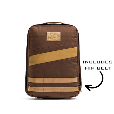 The Rucker 4.0 backpack features tan accents and a zipper with an arrow labeled "INCLUDES HIP BELT"—ideal for rucking or carrying your Ruck Plates.