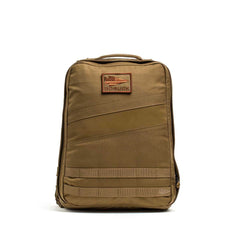 The Rucker 4.0 is a tan tactical rucksack featuring a top handle, front patch, and horizontal straps—perfect for rucking workouts or everyday adventures.