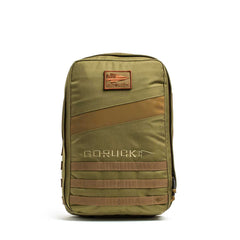 The Rucker 4.0 is an olive green GORUCK fitness rucksack featuring front MOLLE webbing and a top patch—ideal for carrying ruck plates during your next rucking workout.