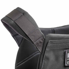 Close-up of a padded black shoulder strap on the Rucking Weight Vest, featuring visible stitching and designed for comfort during workouts with Curved Ruck Plates.