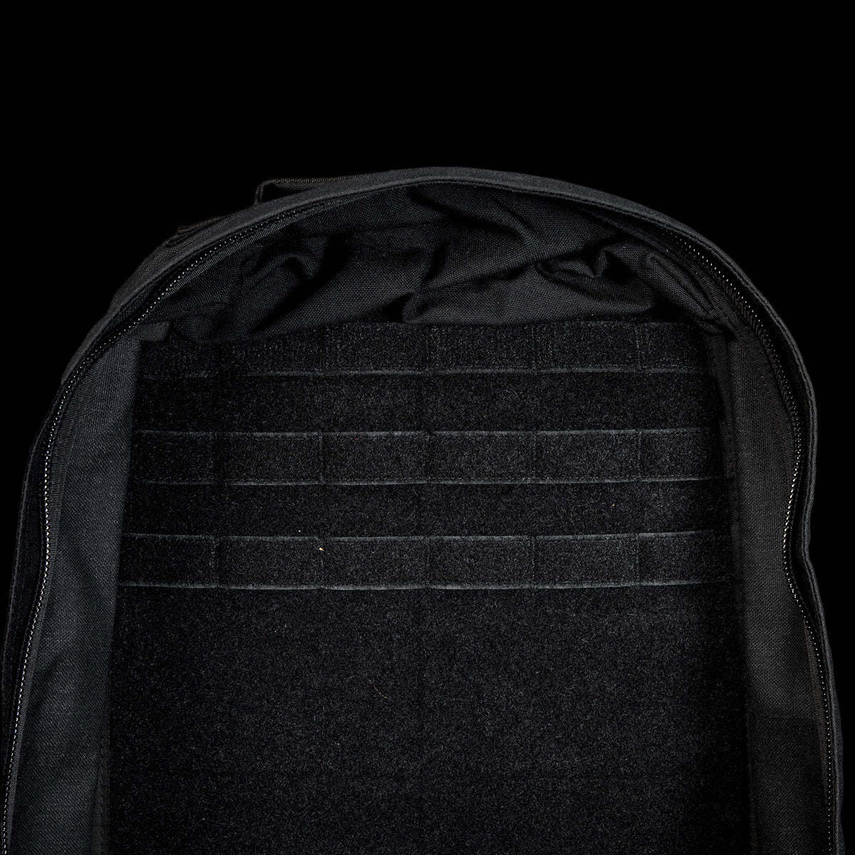 The inside of the empty GR1 Shooter 26L - Built by SCARS backpack features velcro panels and horizontal straps, made from Special Forces Grade CORDURA® for exceptional durability and performance.