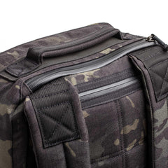 Close-up of a black GR1 USA Slick - Ballistic Nylon Cordura backpack showcasing the handle, zippers, shoulder straps, and bombproof laptop compartment—exemplifying top-tier American craftsmanship.