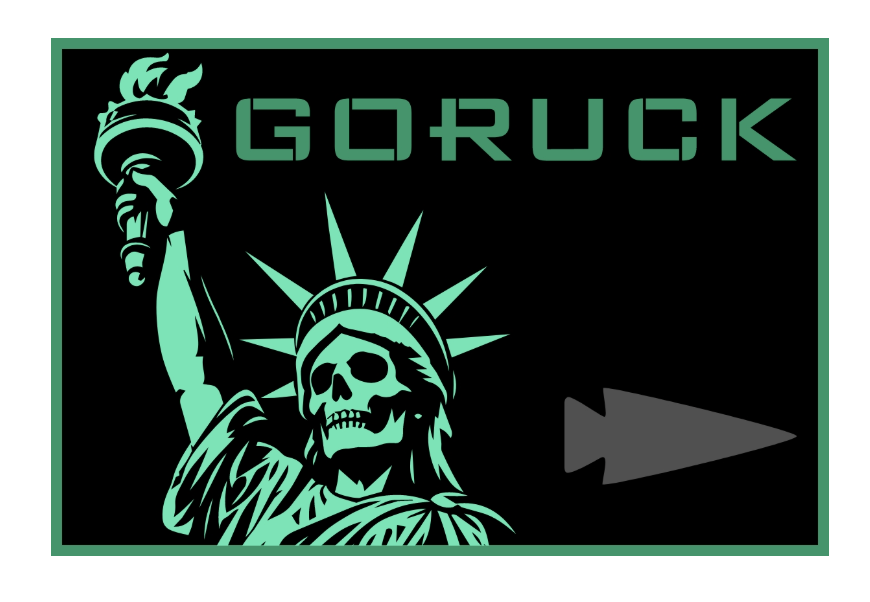 Rectangular GORUCK patch featuring a stylized Statue of Liberty with a skull face and a grey arrow-like emblem on a black background, inspired by the Liberty’s Torch WOD.