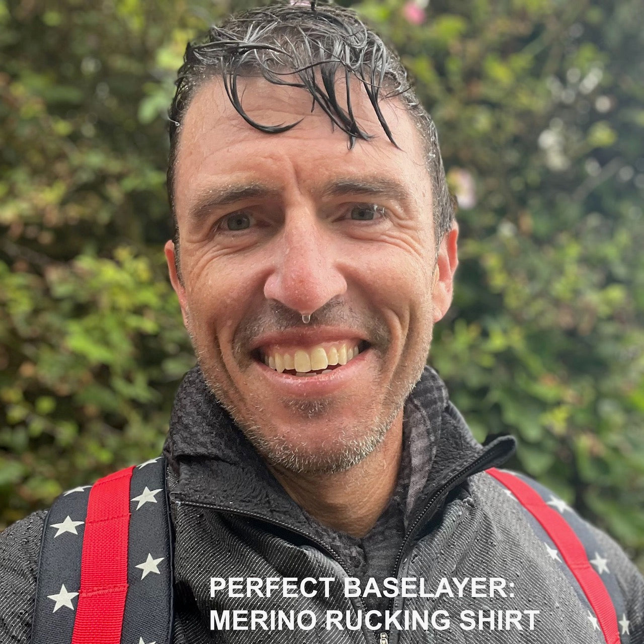 Smiling man with wet hair and red-strap backpack outdoors. Text: 