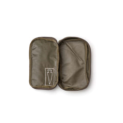 The Shadow Pockets is an open olive green Cordura pouch with a stitched white logo on the left, featuring two empty compartments—ideal for organizing your rucksack.