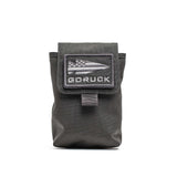 The Simple Side Pocket is a black pouch with a flap, GORUCK bullet-and-flag patch, and patch-friendly VELCRO for easy customization, designed for ruck organization.