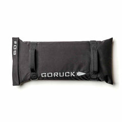A black Simple Training Sandbag, featuring handles and a white logo, is displayed on a flat white background. Ideal for home gyms, this sandbag is backed by the Scars Lifetime Guarantee for durability in every workout.