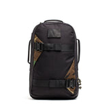 GORUCK black backpack with woodland camo accents and sturdy buckles, front view