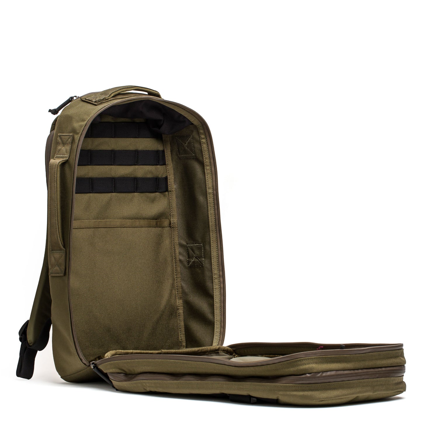 The Skate Ruck, an open olive green EDC backpack with an empty main compartment and durable laptop compartment, is displayed upright on a white background.