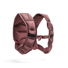 The Spy Ruck | Women's Weighted Vest is a padded maroon vest with adjustable straps and buckle, inspired by GORUCK Spy Ruck designs, shown on a white background.