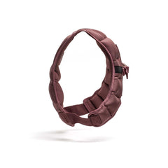A maroon Spy Ruck Women's Weighted Vest, inspired by GORUCK’s durability, floats against a white background.