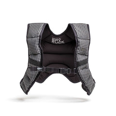 The Spy Ruck | Women's Weighted Vest is a black and white checkered padded vest with buckles and the "Ruck" logo on the chest, inspired by GORUCK’s signature style. Shown on a white background.
