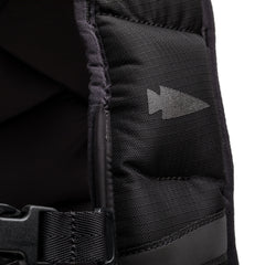 Close-up of black GORUCK rucksack strap with arrowhead logo and durable nylon stitching