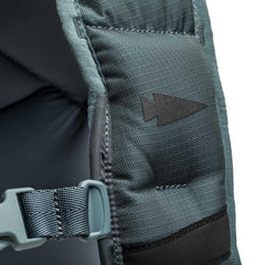 Closeup of GORUCK rucksack shoulder strap with arrowhead patch and durable stitching