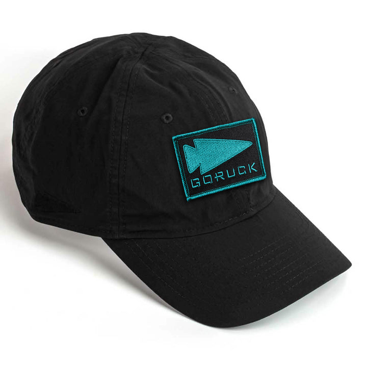 Black Performance TAC Hat made from TOUGHDRY fabric, featuring a blue arrow patch and "GORUCK" on the front.