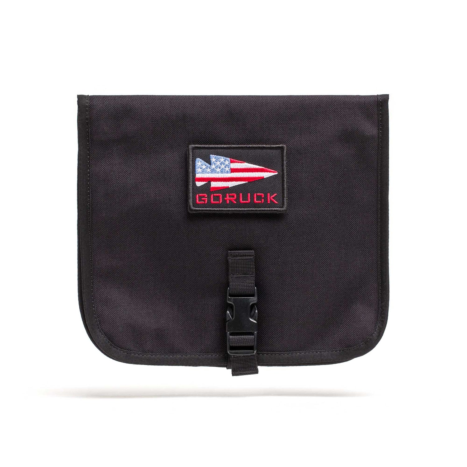 The Wire Dopp is a black pouch with an American flag patch and 