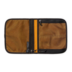 The Wire Dopp is an open brown zippered mesh travel organizer with two compartments and black trim, shown lying flat on a white background—ideal for keeping your EDC essentials organized.