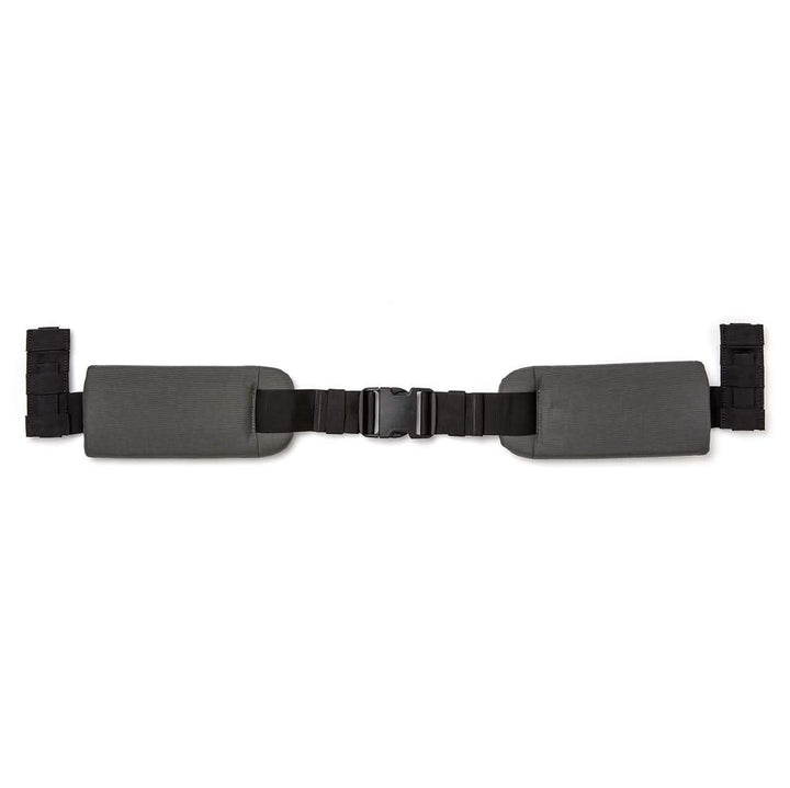 The GORUCK Padded Hip Belt comes in gray with black adjustable straps and a central buckle clasp. Specifically designed for hip carry, it includes additional loops on both sides for attachments, making it ideal for managing heavy loads comfortably.