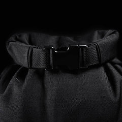 Close-up of black GORUCK rucking backpack buckle and durable fabric