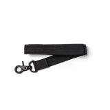 GORUCK black nylon strap with metal clip, durable rucking gear accessory on white background