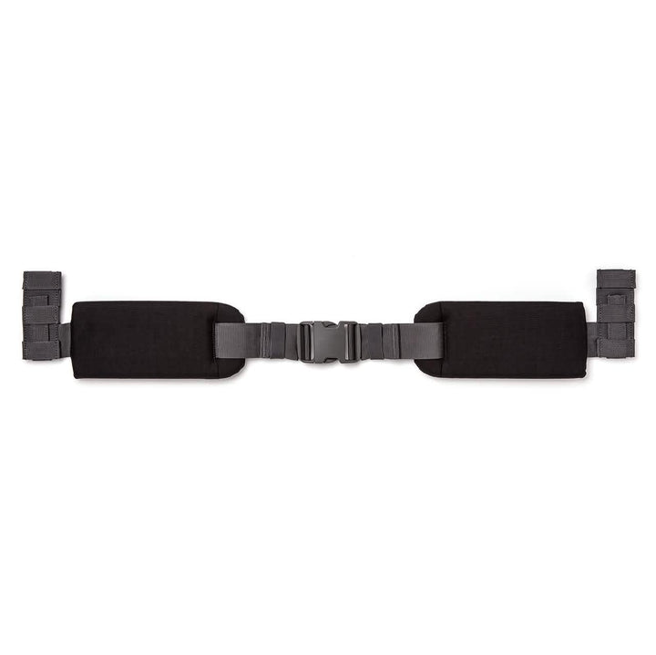 Introducing the GORUCK Padded Hip Belt: a black belt featuring adjustable straps, padded sections on each side, and a central buckle. It’s perfect for hip carrying or securing heavy loads comfortably.