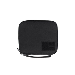 The GR2 Field Pocket by GORUCK is a black square pouch made from durable 1000D Cordura. It includes a zipper, a small strap on one side, and features a patch pocket in the lower right corner, making it perfect as an electronics organizer for those on the go.