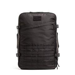 Black rugged GORUCK tactical backpack with modular rows and compression straps on white background