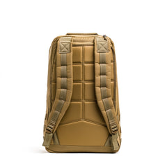 The GR1 rucksack is shown from the back with padded straps and a quilted back panel, set against a white background.
