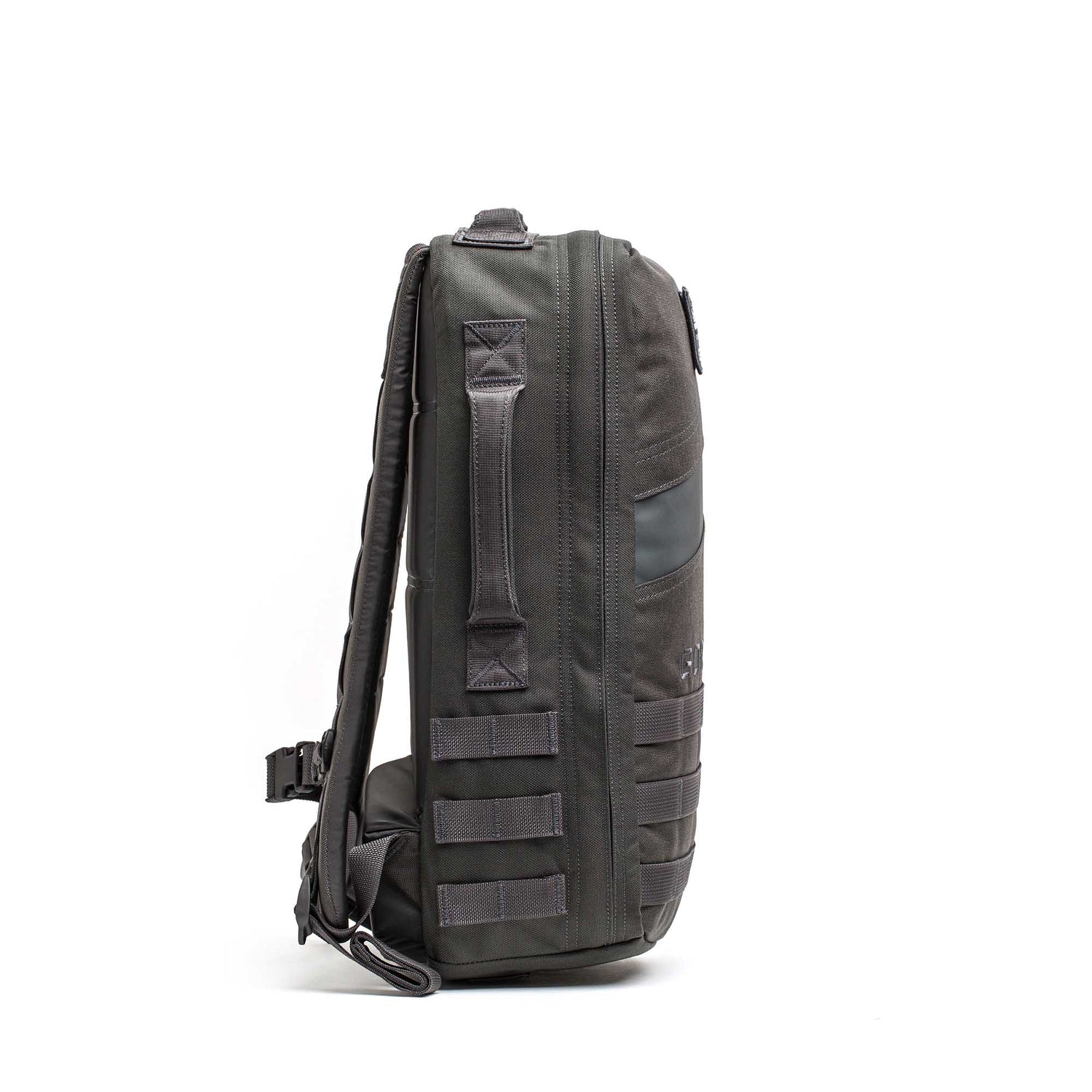 Side view of the dark gray Rucker 5.0, featuring padded straps and webbing loops for rucking, shown against a white background.