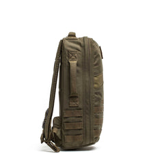 Side view of the olive green Rucker 5.0 rucksack with MOLLE webbing, zippers, and adjustable straps—ideal for rucking and outdoor adventures.