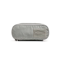 The Shadow Pockets are gray zippered pouches crafted from tough 500D Cordura, featuring a rectangular front patch with an arrow design—perfect for organizing your ruck.