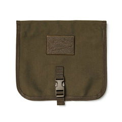 The Wire Dopp by GORUCK is a brown fabric pouch with a flap closure, designed for organized carrying of your travel essentials. It showcases a stitched arrowhead design on the front and is equipped with a durable CORDURA buckle clasp at the bottom.