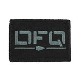GORUCK black embroidered patch with stylized grey lettering and arrow design