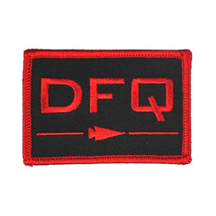 The Patch - DFQ - Black + Red by vendor-unknown is a rectangular black patch showcasing vibrant red embroidered letters "DFQ" and a small red arrow pointing right beneath. It features a striking red border and has VELCRO backing, making it a perfect motivational message wherever displayed.