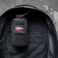 GORUCK mesh water bottle holder with USA patch inside black ruck backpack