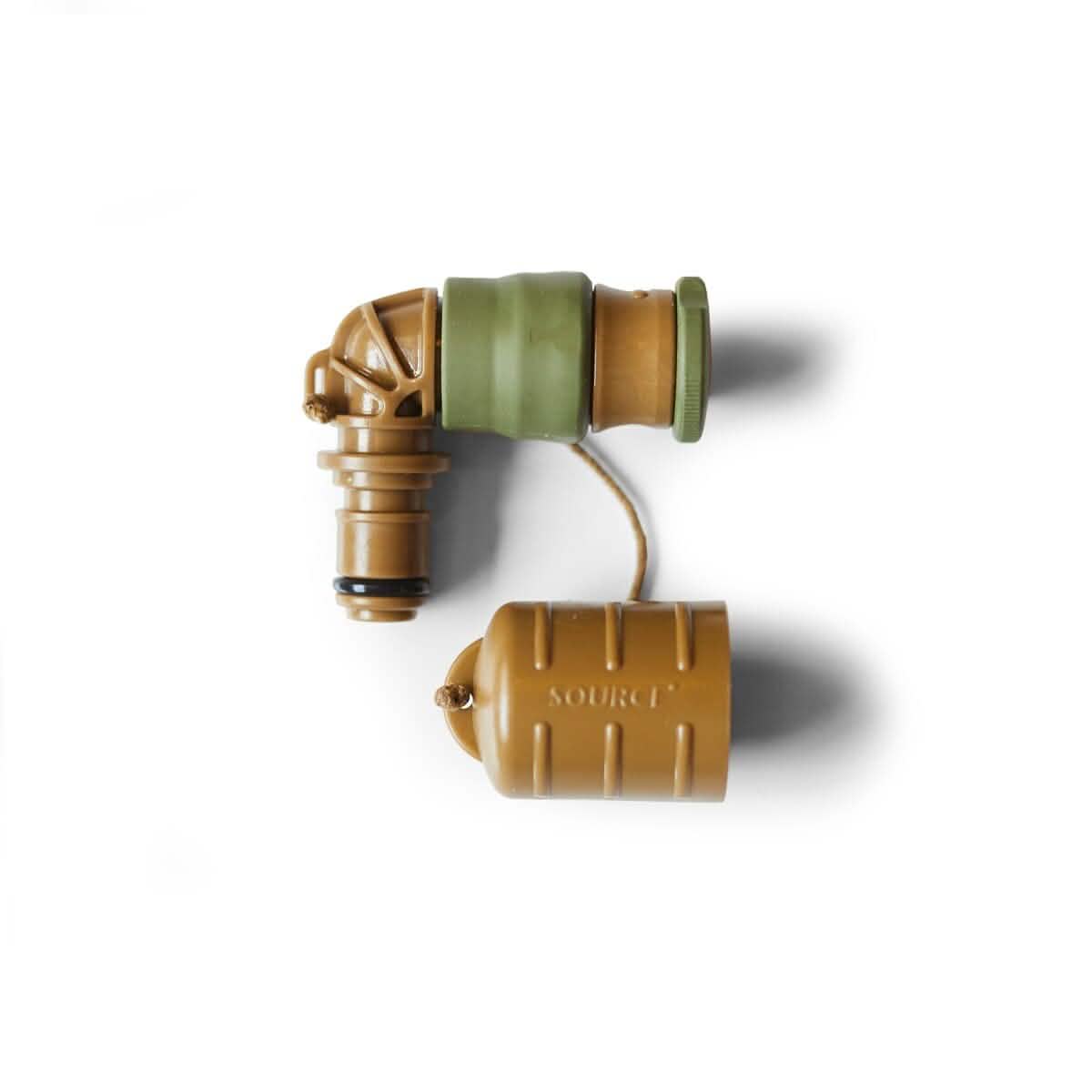 Introducing the Hydration Valve Mouthpiece by GORUCK: This compact, L-shaped component is designed with a military aesthetic and constructed from durable green and tan plastic parts. The left portion features a grooved cylindrical shape, linked by a short tube to a larger tan barrel-shaped section emblazoned with the word 