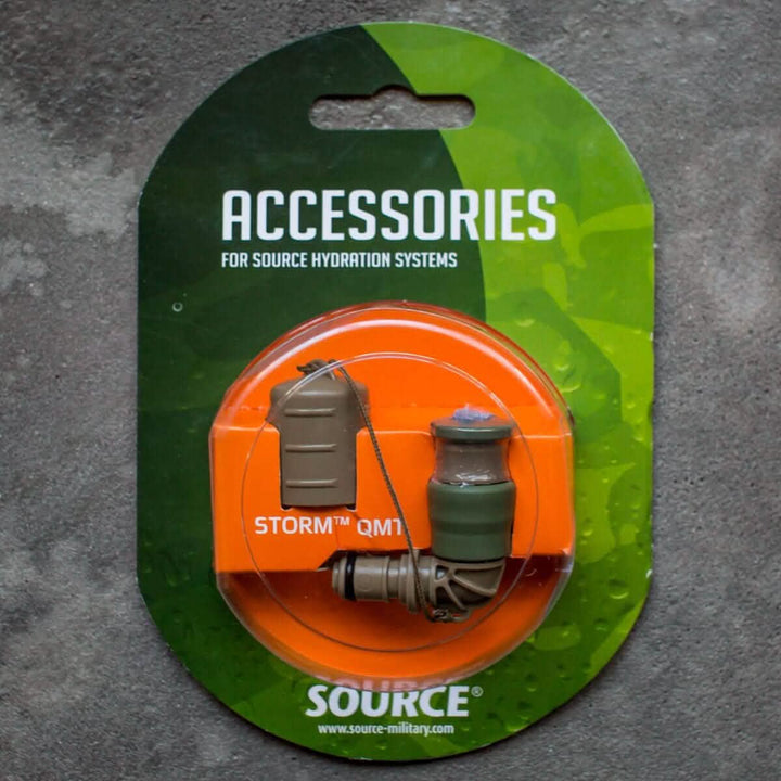 The packaging for the GORUCK Hydration Valve Mouthpiece showcases a sleek design with green and gray colors, set against a vibrant green and orange background. This essential accessory ensures you're always ready for any adventure with your GORUCK hydration system.