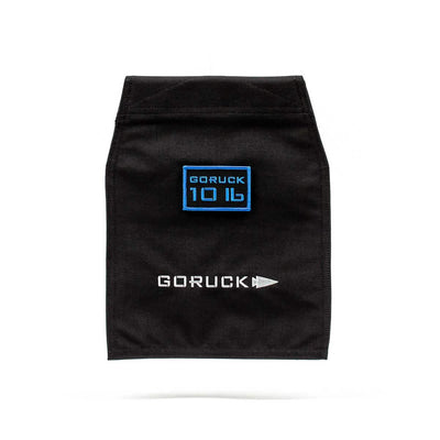 A sleek VELCRO® closure design characterizes the Ruck Sandbag - 10LB by GORUCK. It features a black fabric patch with "GORUCK 10 LB" in blue at the top, and underneath, "GORUCK" is displayed in white alongside a sideways arrowhead symbol.