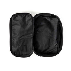 Open black GORUCK Shadow Pocket M showing inner compartments and zipper on white background