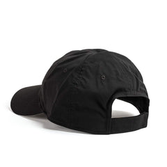 The GORUCK Performance TAC Hat - Slick - TOUGHDRY is displayed from the back, highlighting its six-panel design and adjustable strap with a metal buckle. Constructed from ToughDry® fabric with a sweat-wicking attribute for added comfort, the cap's curved brim can be seen on the left side of the image.