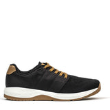 The Men's Ballistic Trainers - Black + White + Coyote by GORUCK are designed for both casual and athletic wear. These shoes feature a black finish with a white sole and tan accents, including tan laces, a tan heel tab, and a brown outsole. The breathable engineered warp knit upper material enhances their versatility as functional fitness footwear.