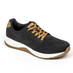 Introducing the Men's Ballistic Trainers by GORUCK, available in Black, White, and Coyote. These trainers feature a sleek black design with brown laces and accents and come with a striking white and brown sole. Crafted for durability with CORDURA® Ballistic Nylon, the shoe also includes a mesh upper section and padded collar for added comfort. Angled positioning allows for an impressive display of both side and top views.
