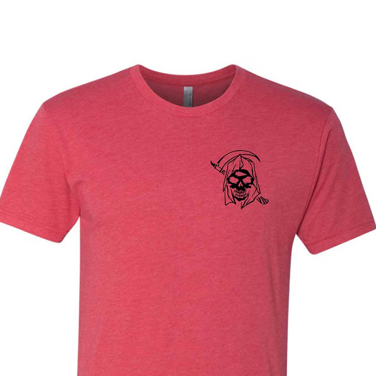 The T-shirt - Life Has Risk - Red features a black grim reaper graphic on the left chest, perfect for showing your GORUCK Tribe pride or connecting with your community.