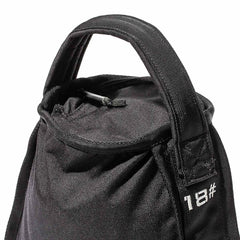 Close-up of a GORUCK Sand Kettlebell in black, featuring a durable handle and visible stitching. Designed for endurance, this kettlebell comes with a drawstring closure at the top and has '18#' printed on the side. Its robust material makes it perfect for fitness enthusiasts seeking a portable workout solution.