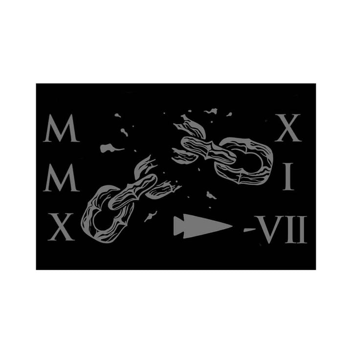 A black background adorned with gray Roman numerals—MMXX, XI, and VII—houses an emblem of two broken chains engulfed in flames at the center, epitomizing the GORUCK Tribe's ethos of freedom. An arrow highlights the fractured links, making this design from GORUCK's "Patch - GORUCK TRIBE - 2021" ideal for those pursuing resilience and strength while earning their patches.