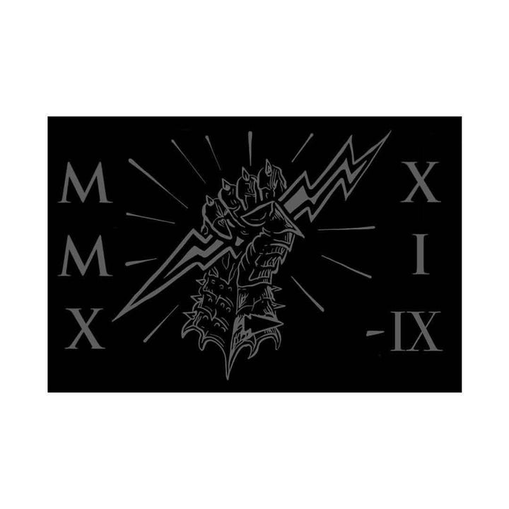 The Patch - GORUCK TRIBE - 2021 by GORUCK features a striking black and white design, with a lightning bolt and a stylized hand in a spiked glove at the center. It is flanked by the Roman numerals MMX on the left and XIX-IX on the right, with rays extending outward, embodying an emblem of bold resilience for GORUCK Tribe members.