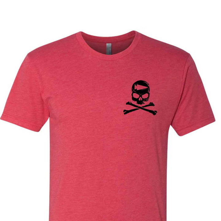 The GORUCK Tribe Tee - Tri-Blend from vendor-unknown is a red T-shirt adorned with a small black skull and crossbones on the left chest, symbolizing the camaraderie created through shared challenges in a GORUCK event.
